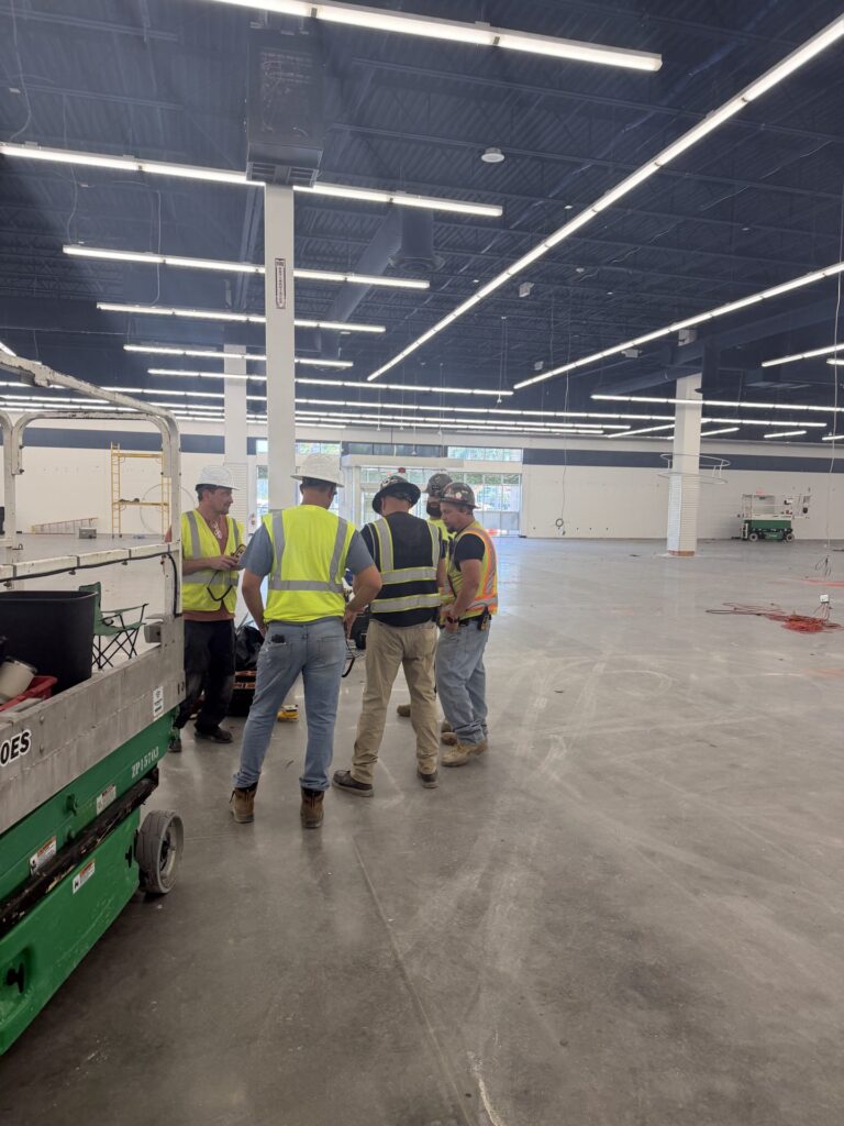 Electrical crew walkthrough on the IKEA Sarasota sales floor