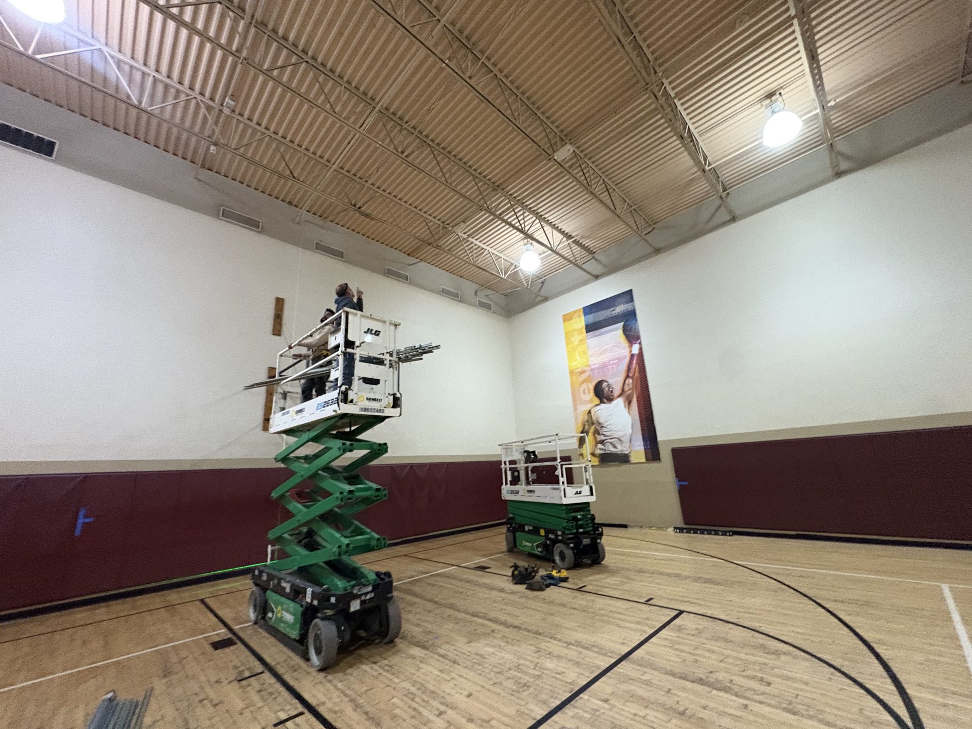 Gym lighting installation from a lift at LA Fitness Tampa